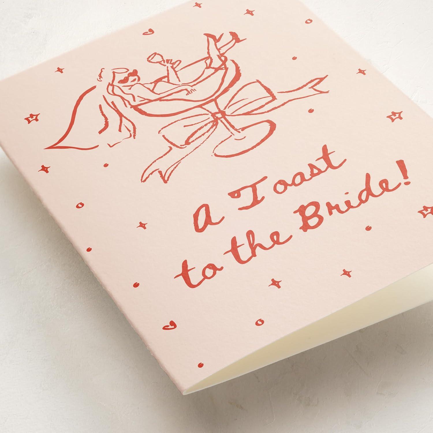 imageMinted Flower Cheers Wedding Card with Gold Foil Champagne Coupes Floral Garnish Illustration Elegant Toast Celebration Greeting for Newlyweds Engagement Bridal Shower Anniversary CongratulationsCheers to Love